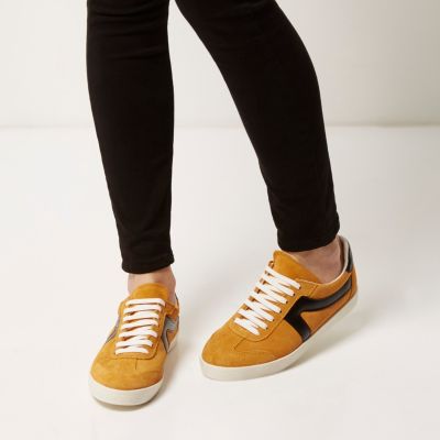 Yellow suede lace-up trainers